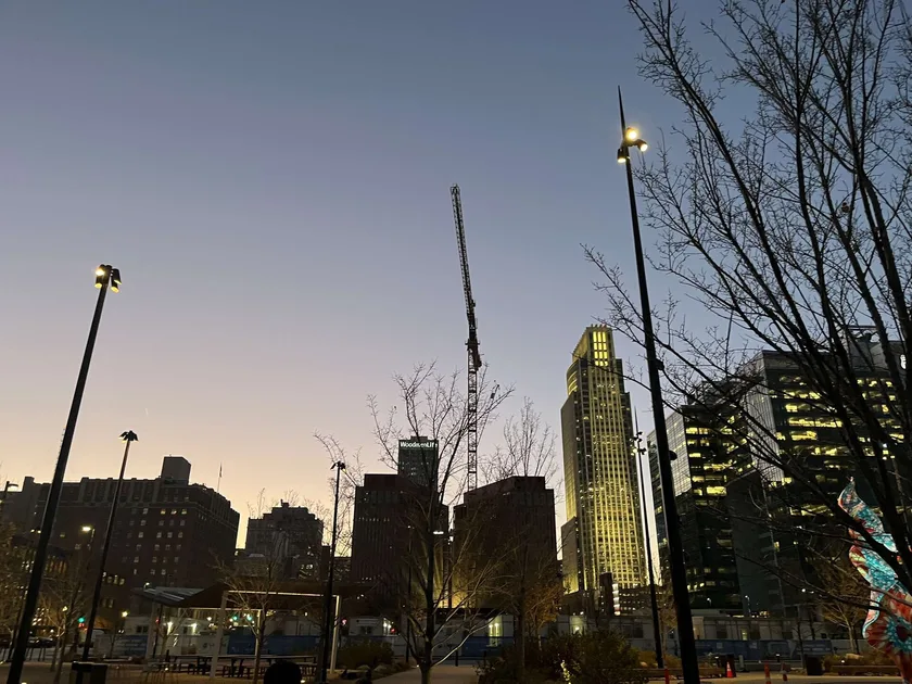 The downtown Omaha skyline at dusk seen from Gene Leahy Mall